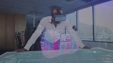 Animation of network of connections over african american businessman wearing vr headset at office. Global networking and business technology concept