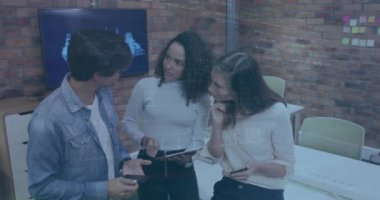 Animation of graphs, trading board over diverse coworkers discussing reports over digital tablet. Digital composite, multiple exposure, stock market, business, teamwork and technology concept.