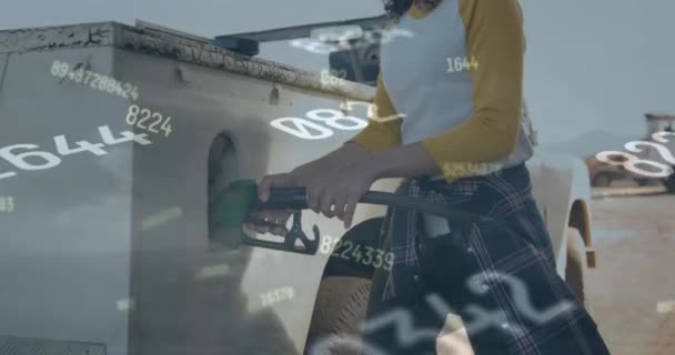 Animation Data Processing Biracial Woman Fueling Car Gas Station Global — Vídeo de stock