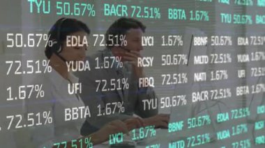 Animation of financial data processing over business people using phone headsets. Global business, finance, computing, connections and data processing concept digitally generated video.