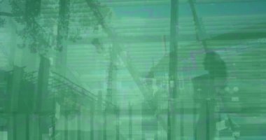 Animation of financial data processing and cityscape. Global business, finance, computing, digital interface and data processing concept digitally generated video.