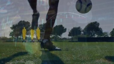 Animation of financial data processing over football players. Global sports, finance, computing, connections and data processing concept digitally generated video.