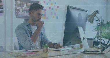 Animation of financial data processing over biracial businessman working in office. Global business, finance, computing and data processing concept digitally generated video.