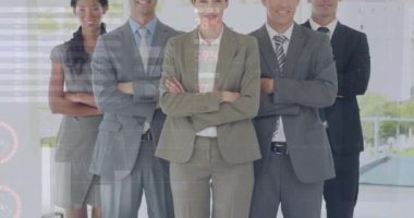 Animation of data processing over diverse business people. Global business, finances, computing and data processing concept digitally generated video.