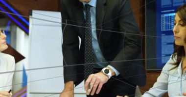 Animation of tunnel in seamless pattern over caucasian businessman talking to colleagues at office. Business technology concept