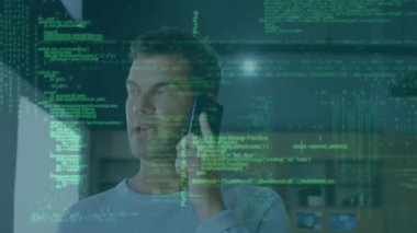 Animation of data processing over caucasian businessman working in office. Global business and digital interface concept digitally generated video.