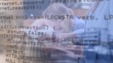Animation of data processing over mid section of female teacher using laptop at school. Education technology concept