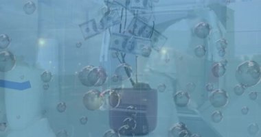 Animation of graphs, bubbles, money plant and vehicles over caucasian worker keeping box in vehicle. Digital composite, multiple exposure, report, finance, currency, distribution and technology.