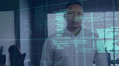 Animation of grid pattern and programming language over biracial businessman standing in office. Digital composite, multiple exposure, coding, machine learning and technology concept.