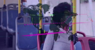 Animation of data processing over african american woman wearing face mask and sitting in bus. Global pandemic, communication and digital interface concept digitally generated video.