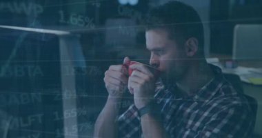 Animation of financial data processing over caucasian businessman using computer. Global business, finance, computing and data processing concept digitally generated video.