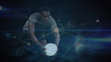 Animation of data processing over african american male rugby player. Global sports, connections, computing and data processing concept digitally generated video.