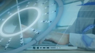 Animation of scope with data processing over caucasian businessman using laptop. Global connections, business, finance, computing and data processing concept digitally generated video.