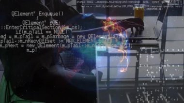 Animation of data processing and globe over man using laptop. Global business, finance, computing, connections and data processing concept digitally generated video.