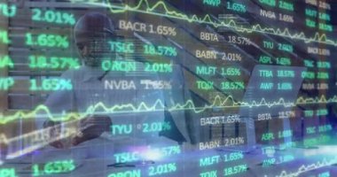 Animation of financial data processing over african american engineer working on his model at office. Global economy and business data technology concept
