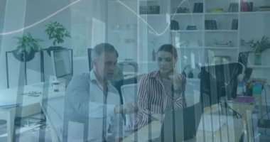 Animation of data processing over caucasian business people working in office. Global business and digital interface concept digitally generated video.