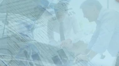 Animation of financial data processing and statistics over man writing. Global finance, business and data processing concept digitally generated video.