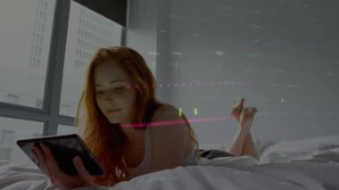 Animation of data processing over woman with tablet. Global computing, finance, business and data processing concept digitally generated video.