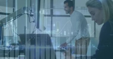 Animation of graphs and buildings over excited caucasian man giving high five to coworker in office. Digital composite, multiple exposure, report, celebration, business, skyscraper and technology.