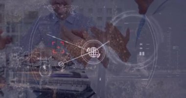Animation of connected icons, map and building over diverse coworkers applauding for manager. Digital composite, multiple exposure, success, communication, teamwork and technology concept.
