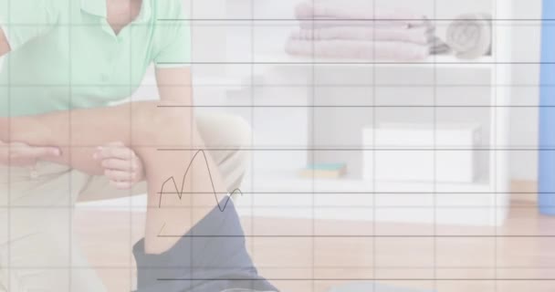 Animation Graphs Numbers Caucasian Man Doing Thumbs While Physiotherapist Stretching — Wideo stockowe