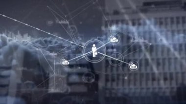 Animation of connected icons, graphs over dense clouds against building in background. Digital composite, multiple exposure, report, business, nature, communication and abstract concept.