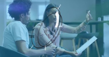 Animation of scope scanning over diverse business people working in office. Global business and digital interface concept digitally generated video.