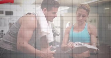 Animation of graphs and numbers over caucasian man and woman discussing diet chart in gym. Digital composite, multiple exposure, report, business, communication, fitness and active lifestyle.