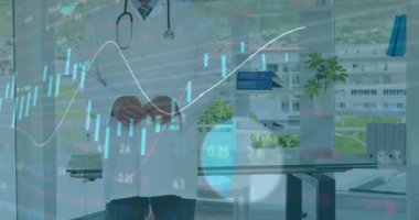 Animation of infographic interface moving over portrait of smiling caucasian male doctor in hospital. Digital composite, multiple exposure, confident, medical, healthcare, database, technology.