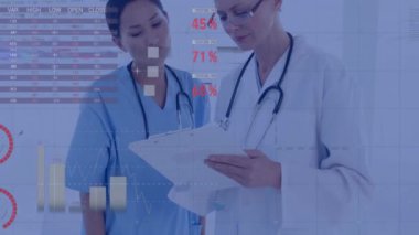 Animation of data processing over two diverse female doctors discussing over clipboard at hospital. Medical healthcare technology concept