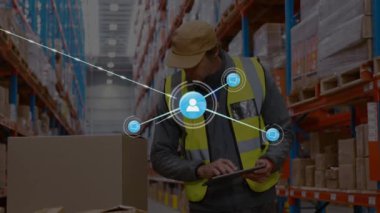 Animation of icons connecting with lines, caucasian foreman with tablet examining box in warehouse. Digital composite, multiple exposure, technology, message, social media, logistics and shipping.