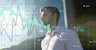 Animation of statistical data processing over happy caucasian man celebrating outside his office. Business data technology concept