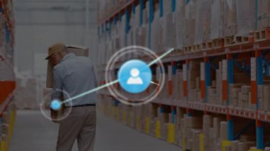 Animation of connected message and profile icons, caucasian man carrying boxes in warehouse. Digital composite, multiple exposure, shelf, social media, rear view, logistics and shipping concept.