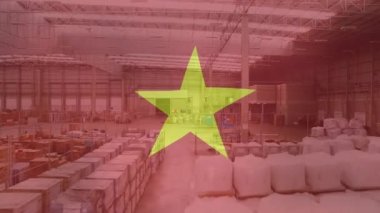 Composite video of waving vietnam flag against aerial view of warehouse. Global networking and logistics business concept