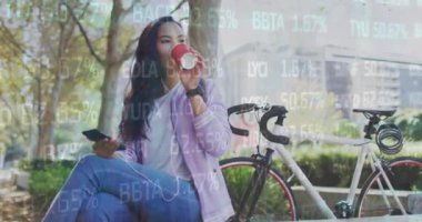 Animation of stock market data processing over asian woman drinking coffee on the street. Global economy and business technology concept