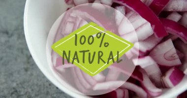 Video of 100 percent natural text over chopped red onions. Vegan food, fresh fruit and vegetables concept digitally generated video.