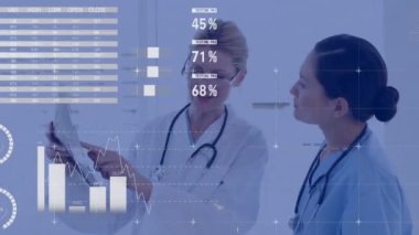 Animation of data processing over two diverse female doctors discussing over x-ray at hospital. Medical healthcare technology concept