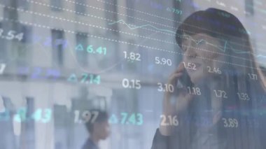 Animation of trading board and graphs over caucasian businesswoman talking on cellphone on street. Digital composite, multiple exposure, stock market, report, city, business and technology concept.
