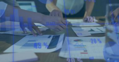 Animation of financial data processing over diverse business people. Global business, finances, computing and data processing concept digitally generated video