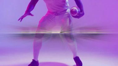 Animation of level up text over american football player on neon background. Sports and communication concept digitally generated video.