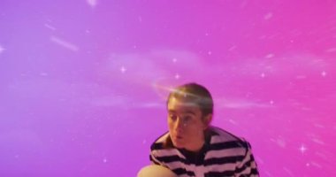 Animation of flickering light over female rugby player on neon background. Sports and communication concept digitally generated video.