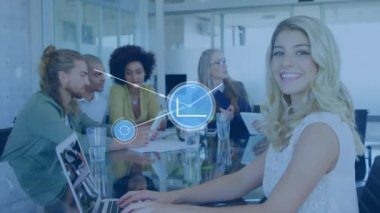 Animation of network of connections with icons over diverse business people. Global business, finances, computing and data processing concept digitally generated video.