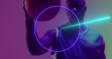 Animation of shapes and light trails over basketball player on neon background. Sports and communication concept digitally generated video.