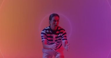 Animation of neon circles over female rugby player on neon background. Sports and communication concept digitally generated video.