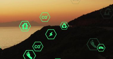 Animation of sustainability and ecology icons over landscape. Ecology, sustainability and data processing concept digitally generated video