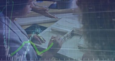 Animation of financial data processing over diverse business people. Global business, finances, computing and data processing concept digitally generated video