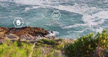 Animation of sustainability and ecology icons over landscape. Ecology, sustainability and data processing concept digitally generated video