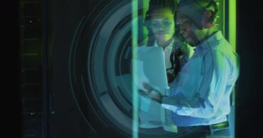 Animation of data processing and binary coding over diverse it engineers and computer servers. Global computing and data processing concept digitally generated video