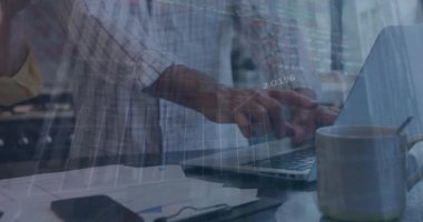 Animation of stock market data processing over mid section of two men discussing over laptop. Global economy and business technology concept