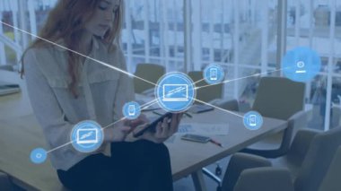 Animation of network of connections with icons over caucasian businesswoman. Global business, finances, computing and data processing concept digitally generated video.